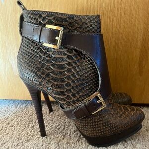 Michael Kors brown leather stiletto boots. New. Never worn. Size 9.5